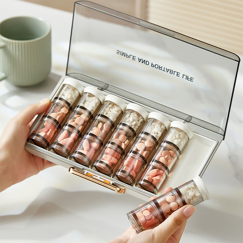 7-Day Portable Pill Box – Large Capacity Medicine Organizer & Dispenser with Daily Reminder Compartments
