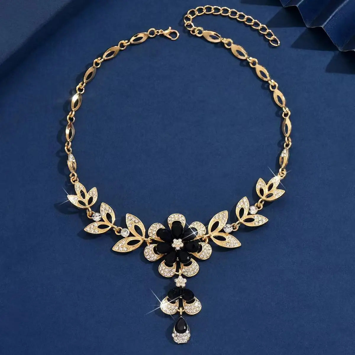 Elegant Gold Hollow Flower Necklace with Rhinestones