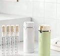 TravelMate 4-in-1 Refillable Bottle Set – Portable Cosmetic & Shampoo Dispenser Organizer