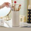 Large Capacity Press-to-raise Dustproof Organizer Brush Holder For Vanity Desktop Bathroom Countertop